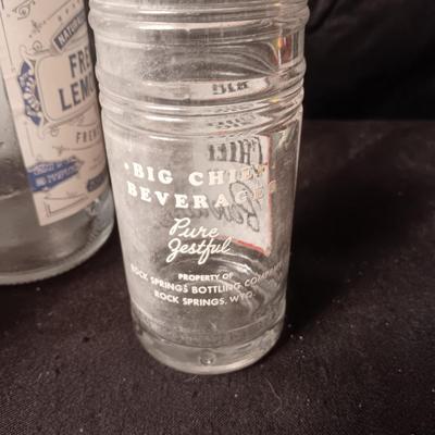 A COLLECTION OF GLASS BOTTLES