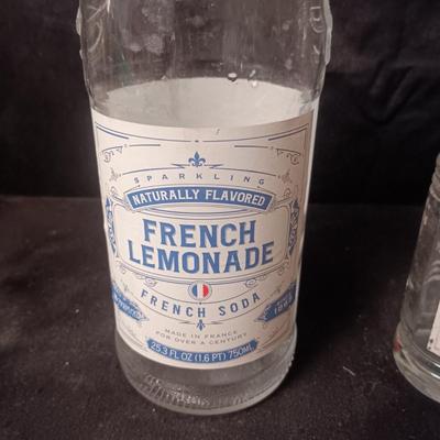 A COLLECTION OF GLASS BOTTLES