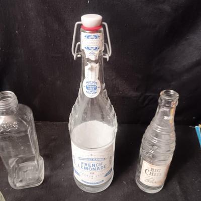 A COLLECTION OF GLASS BOTTLES