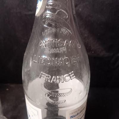 A COLLECTION OF GLASS BOTTLES