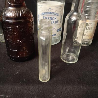 A COLLECTION OF GLASS BOTTLES
