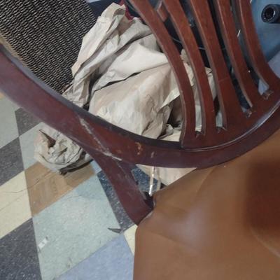 Set of four wood framed chairs with brass tack accents