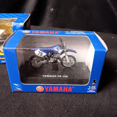 SCALED MODELS OF YAMAHA YZ 125 MOTORCYCLE AND ROAD & TRACK STATE TROOPER CAR