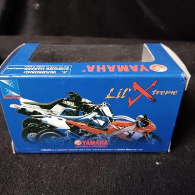 SCALED MODELS OF YAMAHA YZ 125 MOTORCYCLE AND ROAD & TRACK STATE TROOPER CAR