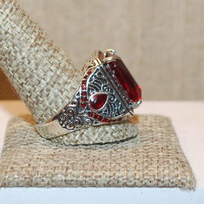 Size 12¼ Large Red Emerald Cut Stone Ring with Red Side Stone Accents on a Solid Silver Tone Band (10.7g)