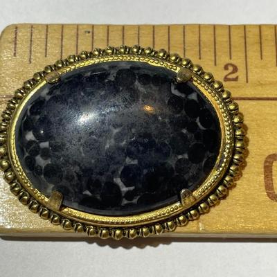 Vintage/Antique Gold-tone Onyx Style Pin/Brooch Preowned from an Estate in Good Preowned Condition.