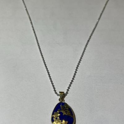 VINTAGE Dainty 14K Yellow Gold Lapis Pendant on a 16" Fashion White Metal Necklace in Very Good Preowned Condition as Pictured.