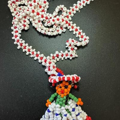 Beaded necklace and woman