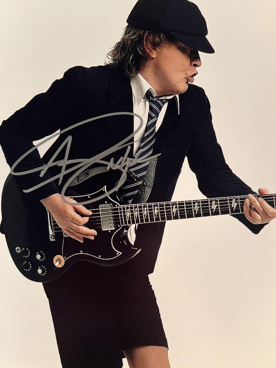 AC/DC Angus Young signed photo | EstateSales.org
