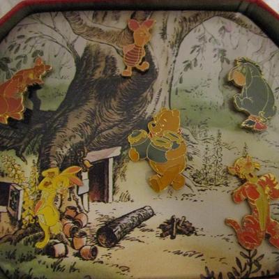 Winnie-the-Pooh commemorative pin set in tin