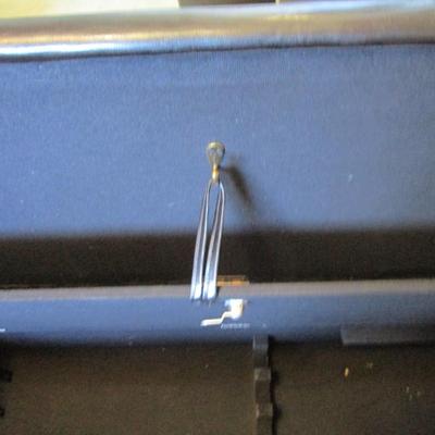 Black vinyl bench, false bottom and lock