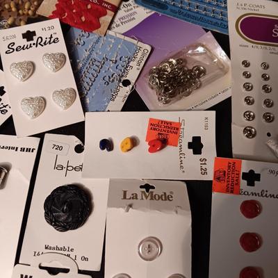 BUTTONS, BEADS, SNAPS AND EDGING