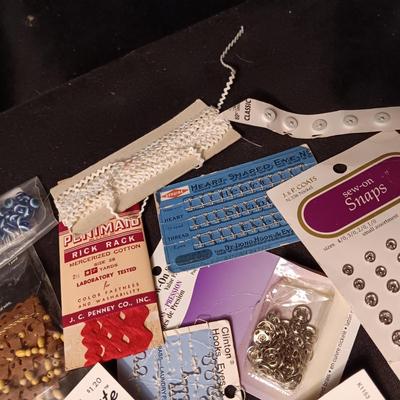 BUTTONS, BEADS, SNAPS AND EDGING