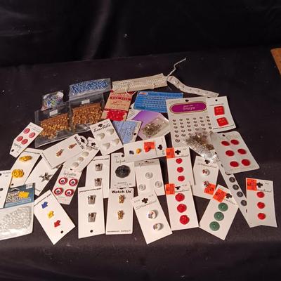 BUTTONS, BEADS, SNAPS AND EDGING