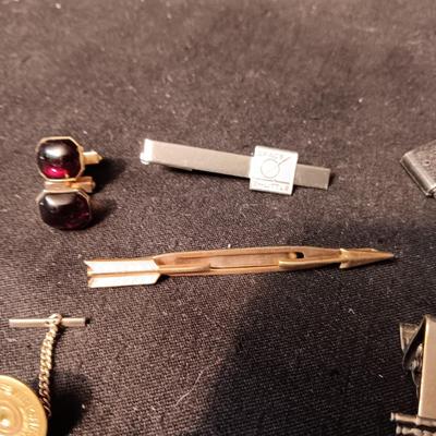 TIE TACKS AND CLIPS, SQUARE NAILS, BUSH CO RODEO TOKEN, CUFFLINKS AND SMALL PADLOCKS