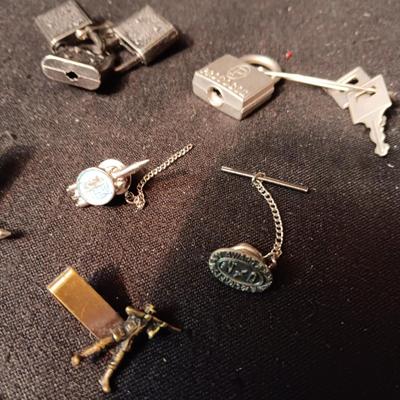 TIE TACKS AND CLIPS, SQUARE NAILS, BUSH CO RODEO TOKEN, CUFFLINKS AND SMALL PADLOCKS