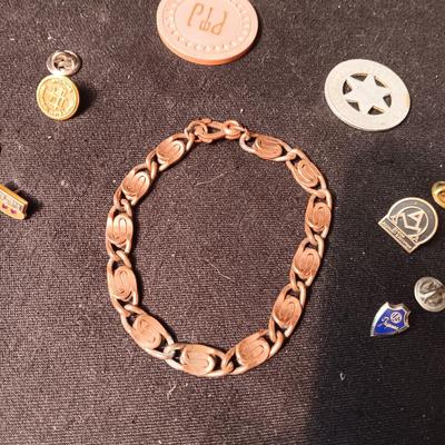 COPPER BRACELET, PINS, POKER CHIP AND LOVELAND, CO TOKENN