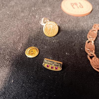 COPPER BRACELET, PINS, POKER CHIP AND LOVELAND, CO TOKENN