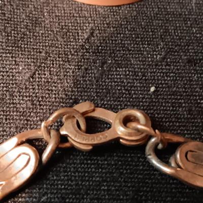 COPPER BRACELET, PINS, POKER CHIP AND LOVELAND, CO TOKENN