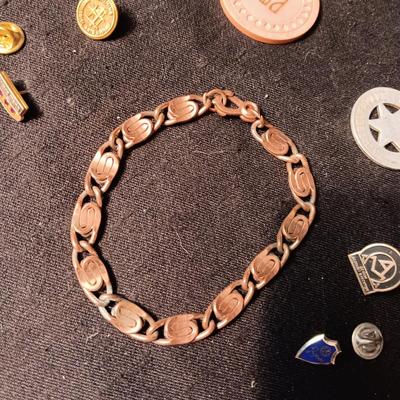COPPER BRACELET, PINS, POKER CHIP AND LOVELAND, CO TOKENN