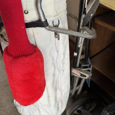 Golfing equipment, movies, and Shelf