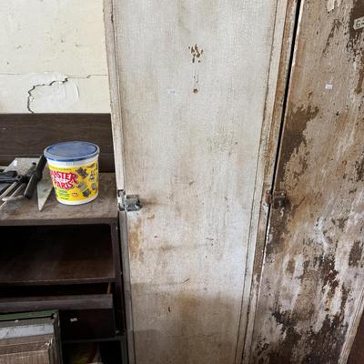 White wooden cabinet and ceramics