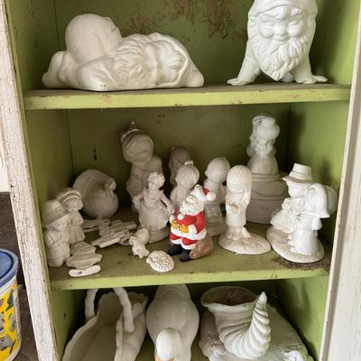 White wooden cabinet and ceramics