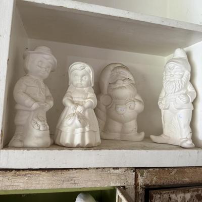 White wooden cabinet and ceramics