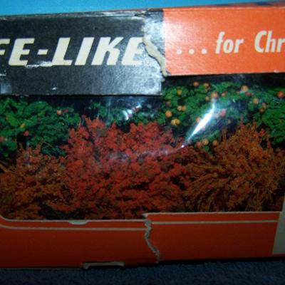 LOT 181 COLLECTABLE LIFE LIKE TREES in boxes