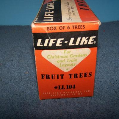 LOT 181 COLLECTABLE LIFE LIKE TREES in boxes