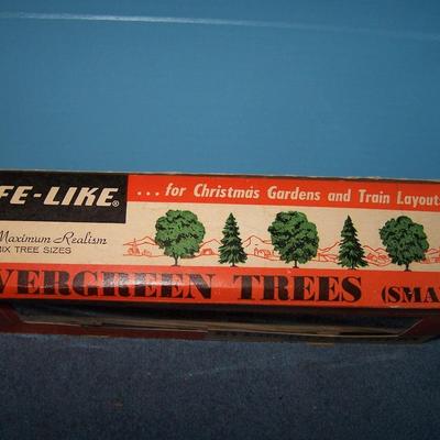 LOT 181 COLLECTABLE LIFE LIKE TREES in boxes