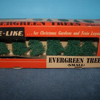 LOT 181 COLLECTABLE LIFE LIKE TREES in boxes