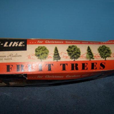LOT 181 COLLECTABLE LIFE LIKE TREES in boxes