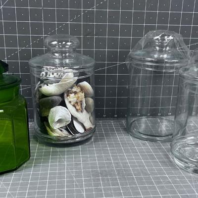 Covered Apothecary Jars one has Sea Shells. 