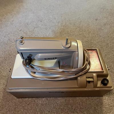 Vintage sewing machine with top