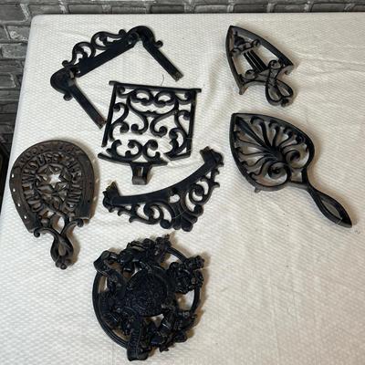 Lot 190 Cast Iron Trivets & other