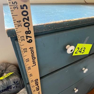 Lot 243 Blue chest of drawers.