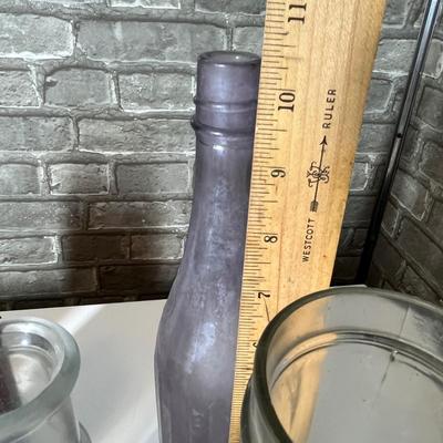 Lot 269 Lot of clear bottles