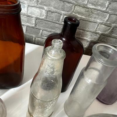 Lot 269 Lot of clear bottles