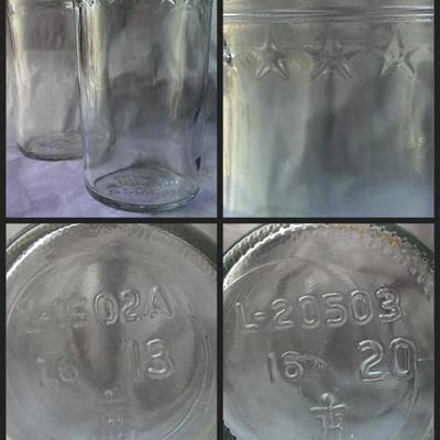 pair of vintage clear glass containers 