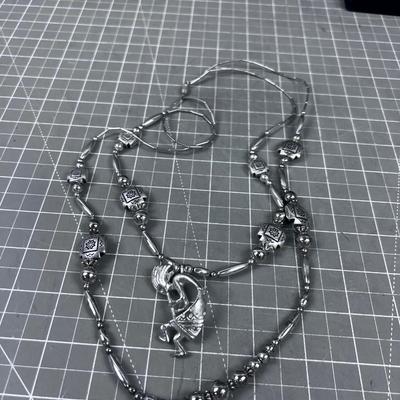 Liquid Silver Kokopelli Necklace