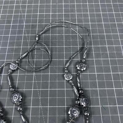 Liquid Silver Kokopelli Necklace