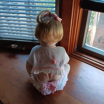 ANTIQUE WICKER BABY BUGGY WITH PORCELAIN BABY DOLL