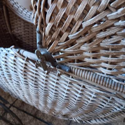ANTIQUE WICKER BABY BUGGY WITH PORCELAIN BABY DOLL