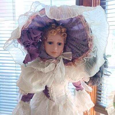 2 BEAUTIFUL PORCELAIN DOLLS