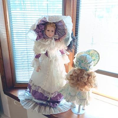 2 BEAUTIFUL PORCELAIN DOLLS