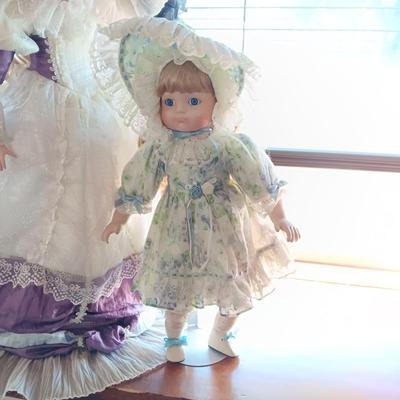 2 BEAUTIFUL PORCELAIN DOLLS