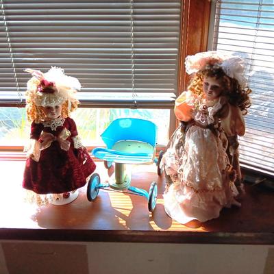 2 FANCY PORCELAIN DOLLS AND A VINTAGE METAL WALKER