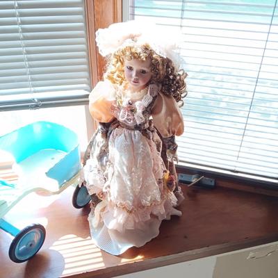 2 FANCY PORCELAIN DOLLS AND A VINTAGE METAL WALKER
