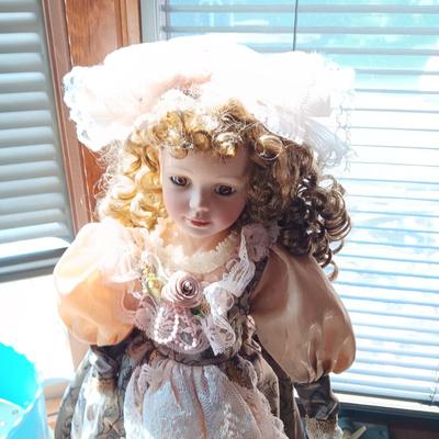 2 FANCY PORCELAIN DOLLS AND A VINTAGE METAL WALKER